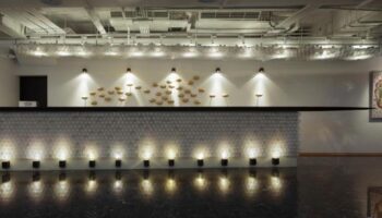 Amba Taipei Ximending hotel lobby. Modern design, textured wall, and lighting. Gay-friendly hotel for gay men travel in Taipei, Taiwan.