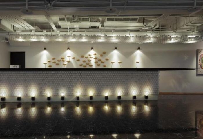 Amba Taipei Ximending hotel lobby. Modern design, textured wall, and lighting. Gay-friendly hotel for gay men travel in Taipei, Taiwan.