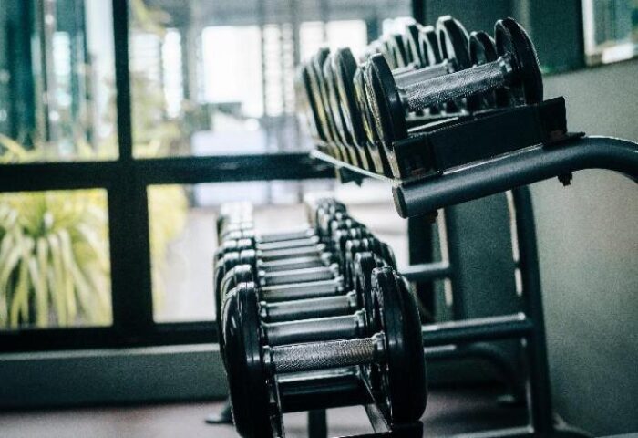 Gym at gay-friendly Amelie Hotel Manila. Dumbbells on rack. Fitness center at this popular hotel. Workout while you travel!