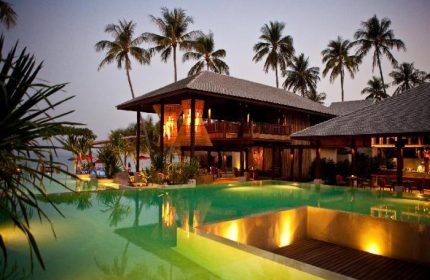 Anantara Rasananda Koh Phangan Villas: Gay-friendly hotel pool view. Tropical luxury resort with palm trees, perfect for gay travel and relaxation.