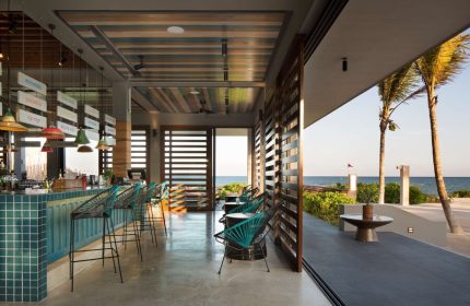 Gay-Friendly Andaz Mayakoba Resort Riviera Maya bar area. Ocean view, stylish design, and relaxed atmosphere. Perfect for gay travelers.