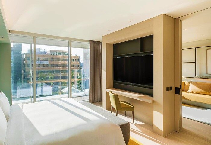 Andaz Seoul Gangnam hotel room. Modern interior, large windows, city view. Gay-friendly hotel in Seoul, South Korea. Luxury travel for gay men.