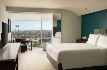 Andaz West Hollywood hotel room with city view. Gay-friendly hotel with modern design, comfortable bed, and scenic views, perfect for gay travelers.