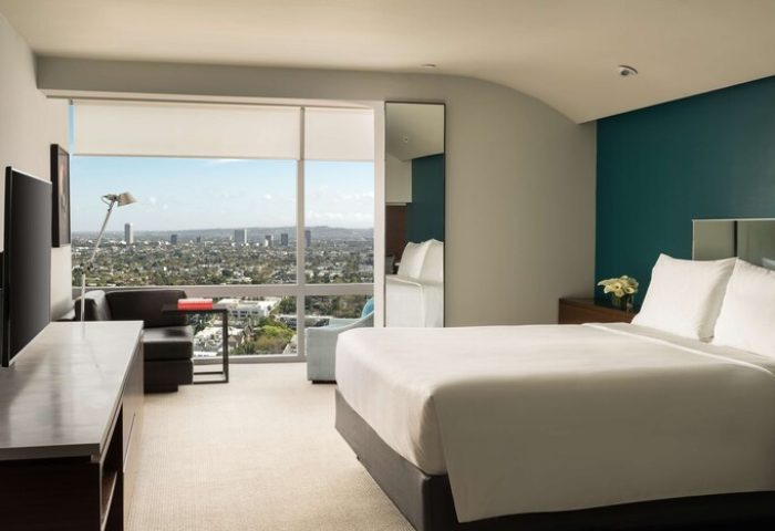 Andaz West Hollywood hotel room with city view. Gay-friendly hotel with modern design, comfortable bed, and scenic views, perfect for gay travelers.