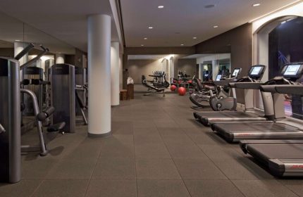 Andaz West Hollywood gay-friendly hotel gym. Treadmills, weights, and exercise equipment in a modern fitness center. Travel advice for gay men.