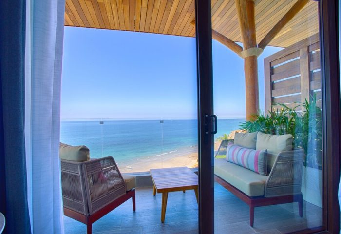 Armony Resort & Spa adults-only suite balcony view. Oceanfront, gay-friendly hotel in Punta de Mita, Mexico. All-inclusive luxury travel.