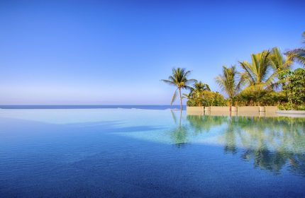Armony Resort & Spa: Infinity pool view at this gay-friendly, adults-only, all-inclusive MGallery hotel. Perfect for gay men's travel.