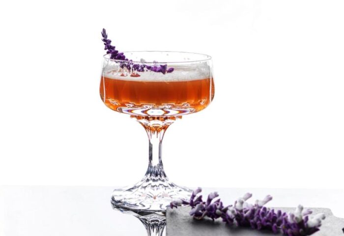 AthensWas Hotel's cocktail. A stylish drink at this gay-friendly hotel in Athens. Lavender garnish. Perfect for gay travelers.