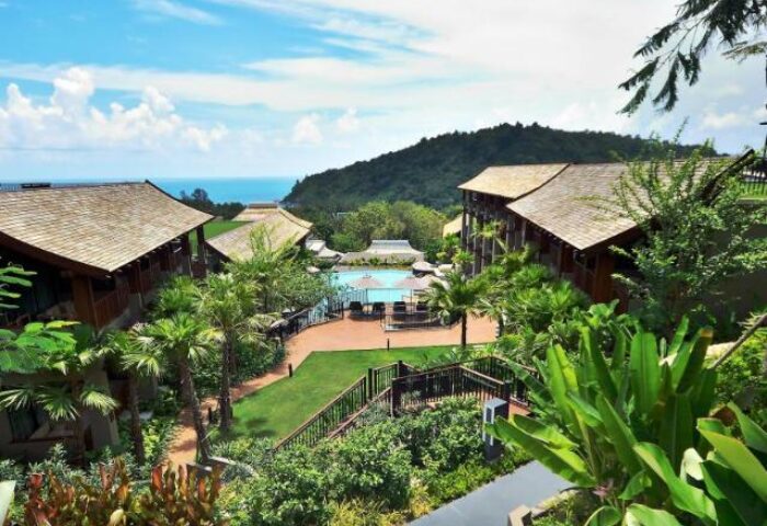 Avista Hideaway Phuket Patong MGallery by Sofitel view. This gay-friendly hotel offers lush landscapes, pool, and ocean views for a relaxing getaway.