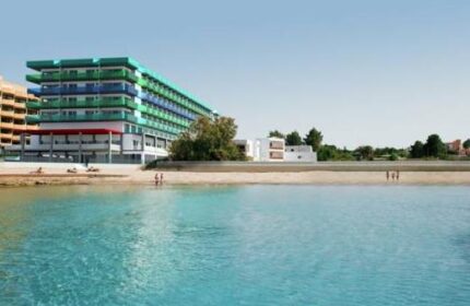 AxelBeach Ibiza Suites, an adults-only, gay-friendly hotel. Beachfront apartments with spa, beach club, and stunning views of Ibiza's coastline.