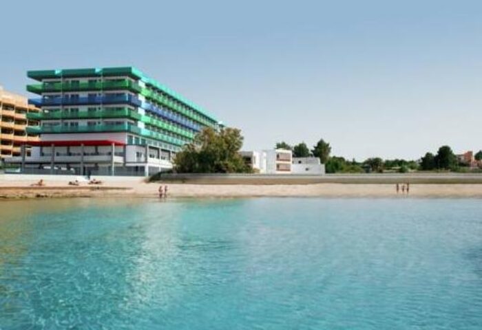 AxelBeach Ibiza Suites, an adults-only, gay-friendly hotel. Beachfront apartments with spa, beach club, and stunning views of Ibiza's coastline.