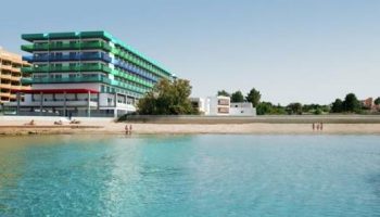 AxelBeach Ibiza Suites, an adults-only, gay-friendly hotel. Beachfront apartments with spa, beach club, and stunning views of Ibiza's coastline.
