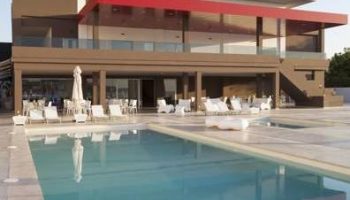 AxelBeach Ibiza Suites Apartments pool. Gay-friendly, adults-only hotel with spa and beach club. Modern architecture.