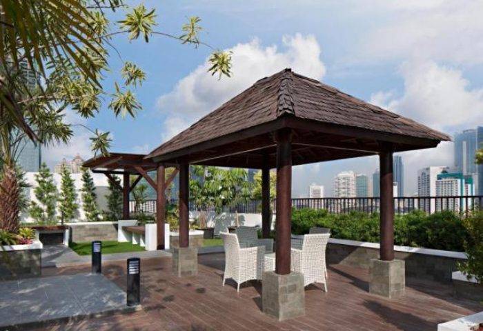 Ayaka Suites gay-friendly hotel rooftop terrace with gazebo and city view. A relaxing spot for gay travelers at this Jakarta hotel.