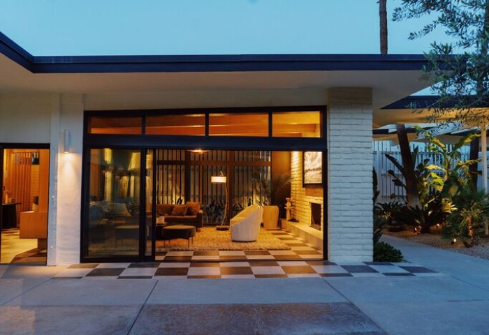 Azure Sky Hotel adults-only gay-friendly hotel room. Modern design with a living room, fireplace, and outdoor access. Palm Springs gay travel.