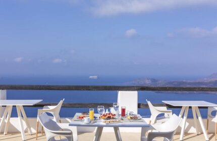 Breakfast with a view at Azzurro Suites, a gay-friendly hotel. Enjoy the scenery from this beautiful hotel. Gay travel advice.