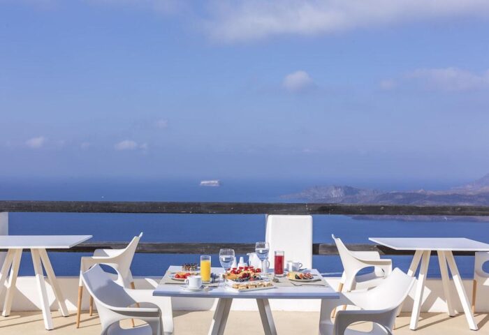 Breakfast with a view at Azzurro Suites, a gay-friendly hotel. Enjoy the scenery from this beautiful hotel. Gay travel advice.