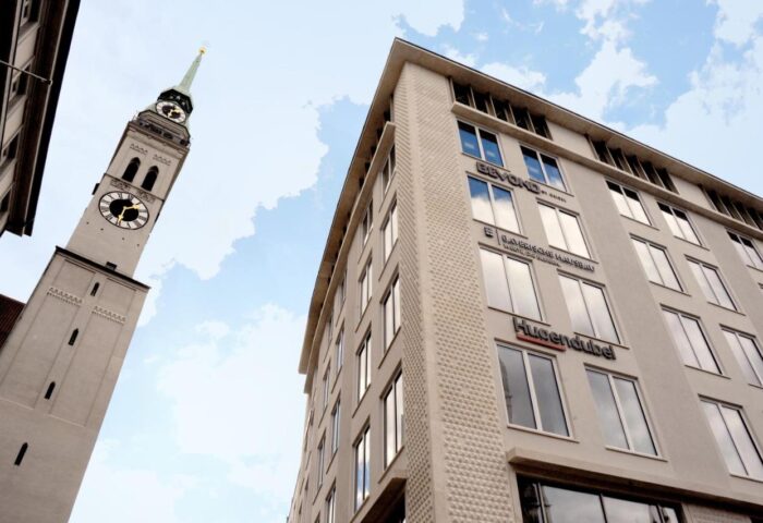 BEYOND by Geisel, a gay-friendly hotel. Exterior shot with tower. Modern design meets classic architecture. A great choice for gay travelers.