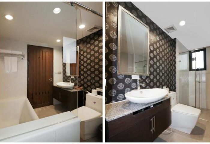 Bally Suite Silom gay-friendly hotel bathroom. Modern design with patterned wallpaper, stylish sink, and walk-in shower for gay travelers.