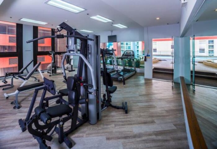 Bandara Suites Silom gay-friendly hotel gym. Fitness center with weight machines, treadmills, and benches. Workout facilities for gay travelers.