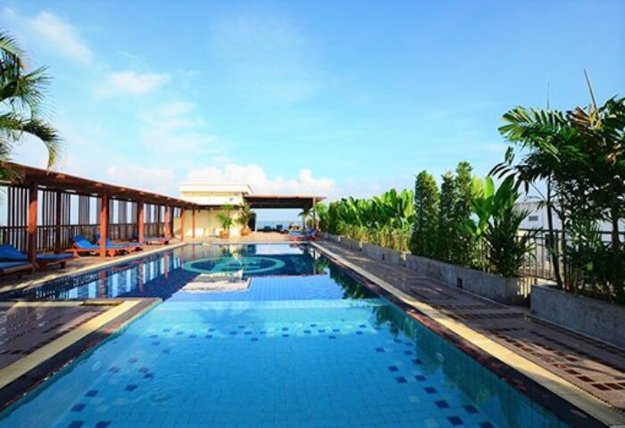 Baywalk Residence gay-friendly hotel pool. Relax at this gay travel destination. Enjoy the rooftop pool and stunning views. Perfect for gay men.