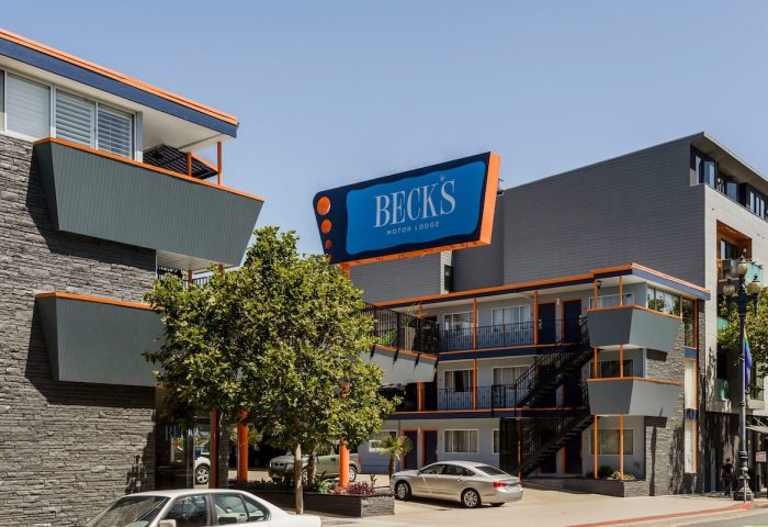 Beck's Motor Lodge, a gay-friendly hotel. Exterior view of the lodge with its retro sign. A great choice for gay men travel.