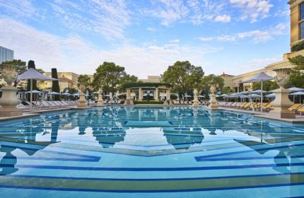 Bellagio Hotel pool, a gay-friendly hotel in Las Vegas. The pool features a beautiful design & lounge chairs. Great for gay travel.
