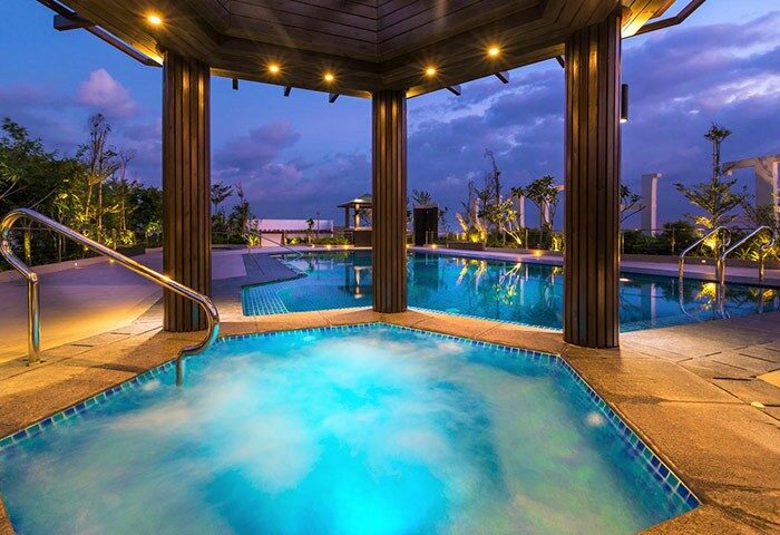 Belmont Hotel Manila's rooftop pool at dusk. This gay-friendly hotel offers a relaxing & luxurious experience for gay travelers.