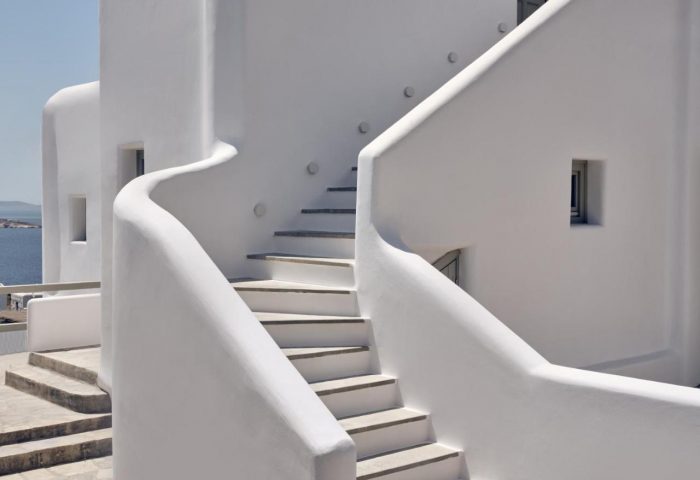 Staircase detail at Belvedere Mykonos Hilltop Complex, a gay-friendly hotel. Whitewashed walls and steps typical of Mykonos architecture.