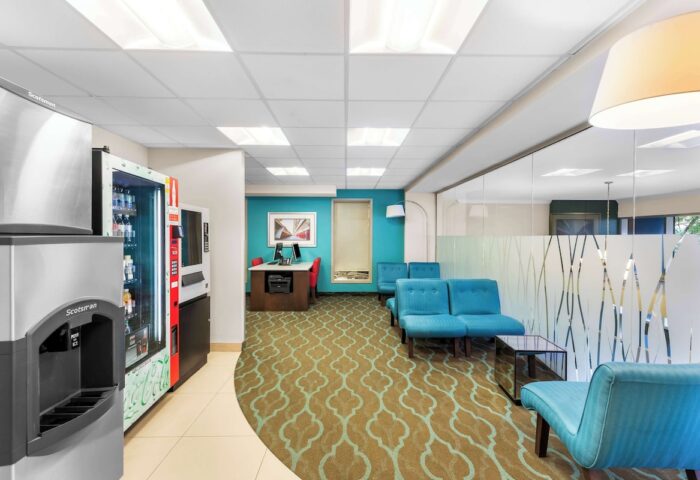 Best Western Plus Hotel Montreal lobby. Gay-friendly hotel with vending machines, seating, and a business center. Comfortable for gay travelers.