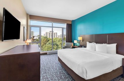 Best Western Plus Hotel Montreal guest room with a large window view. Gay-friendly hotel near Montreal's gay village.