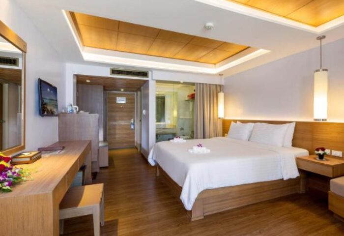 Beyond Resort Karon's gay-friendly hotel room. Modern design, wooden accents, king bed, and ensuite bathroom. Ideal for gay travelers.