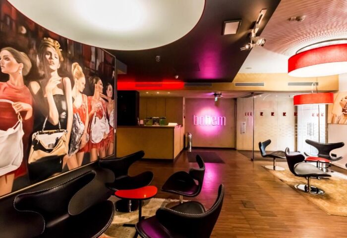 Bohem Art Hotel's stylish lobby. This gay-friendly hotel features modern decor, chic seating, and a vibrant atmosphere. Perfect for gay travel.