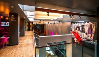 Bohem Art Hotel interior. Modern design, art, and mannequins. Gay-friendly hotel with a stylish bar. Perfect for gay men's travel in Budapest.
