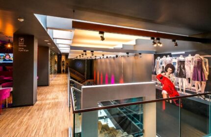 Bohem Art Hotel interior. Modern design, art, and mannequins. Gay-friendly hotel with a stylish bar. Perfect for gay men's travel in Budapest.