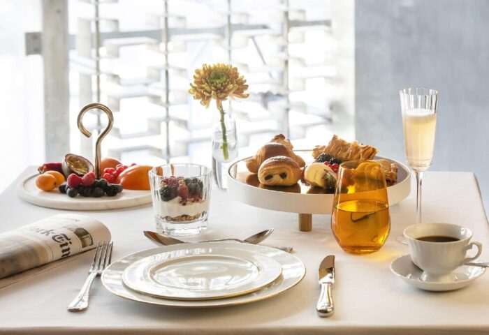 Breakfast at Brown Acropol, a Brown Hotel. Gay-friendly hotel with pastries, fruit, coffee, and juice. A luxury experience for gay travelers.