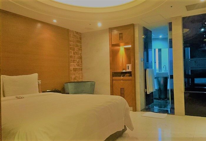 Burgary Hotel room: Gay-friendly hotel featuring a modern bedroom with a king-size bed and a luxurious bathroom. Great for gay travel.