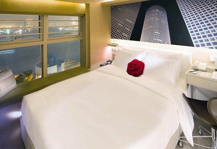 Butterfly on Waterfront Boutique Hotel room. Gay-friendly hotel in Sheung Wan with a waterfront view. Modern design, comfortable bed, and stylish decor. Perfect for gay travel.