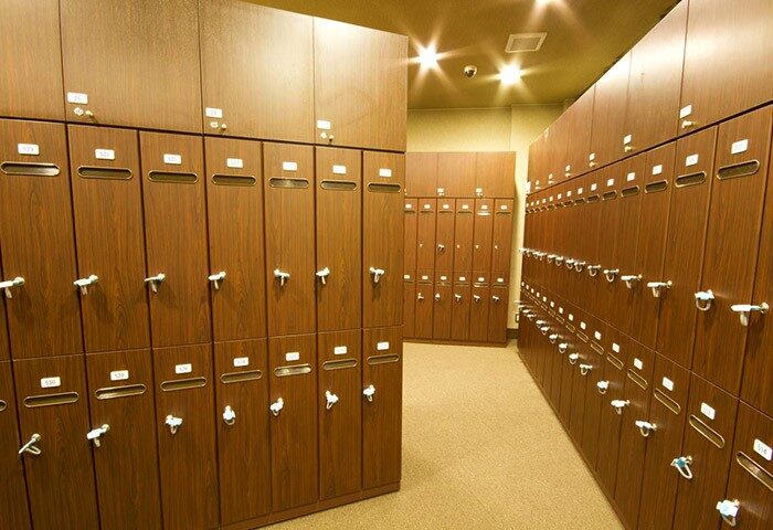 Lockers at Capsule Hotel Anshin Oyado Premier Tokyo Shinjuku Station, a gay-friendly hotel. Secure storage for travelers' belongings.