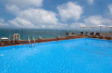 Carlton Tel Aviv Hotel's rooftop pool. Luxury on the beach. This gay-friendly hotel offers stunning sea views and a relaxing atmosphere.