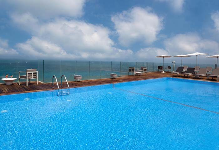 Carlton Tel Aviv Hotel's rooftop pool. Luxury on the beach. This gay-friendly hotel offers stunning sea views and a relaxing atmosphere.
