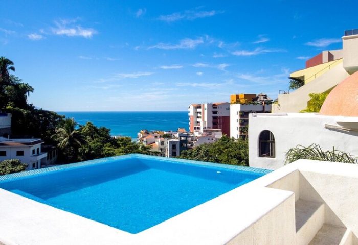 Casa Cupula, gay-friendly hotel: Pool view overlooking Puerto Vallarta, Mexico. Ocean view from this luxury gay resort.