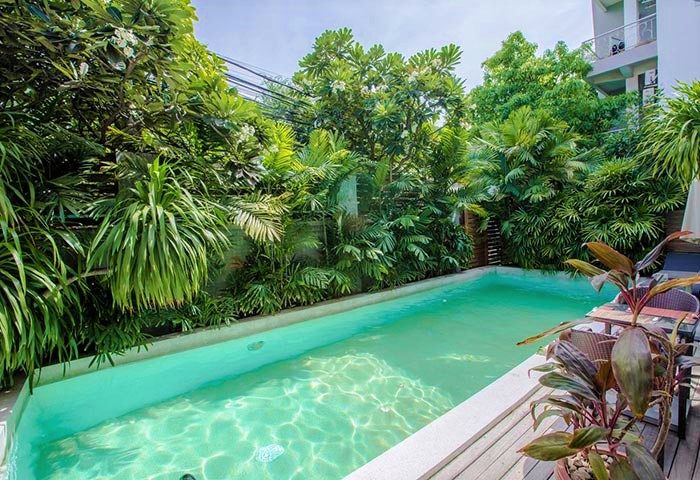 Casa Villa Independence: Gay-friendly hotel pool. Lush tropical garden surrounds the pool at this gay villa, a relaxing oasis for gay travelers.