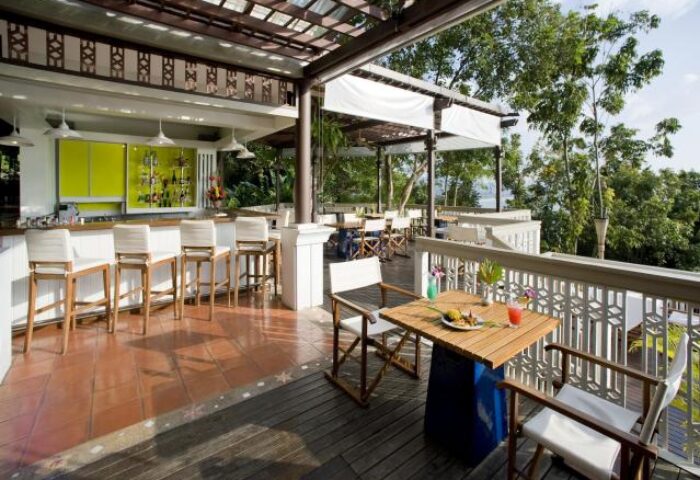 Gay-friendly Centara Villas Phuket Hotel's outdoor bar and dining area. Enjoy cocktails with a view at this Phuket gay travel destination.
