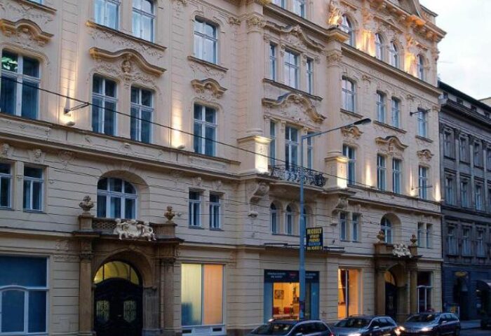 Hotel Century Old Town Prague MGallery facade. Gay-friendly, pet-friendly hotel in Prague's Old Town. Ornate architecture, cars parked outside.