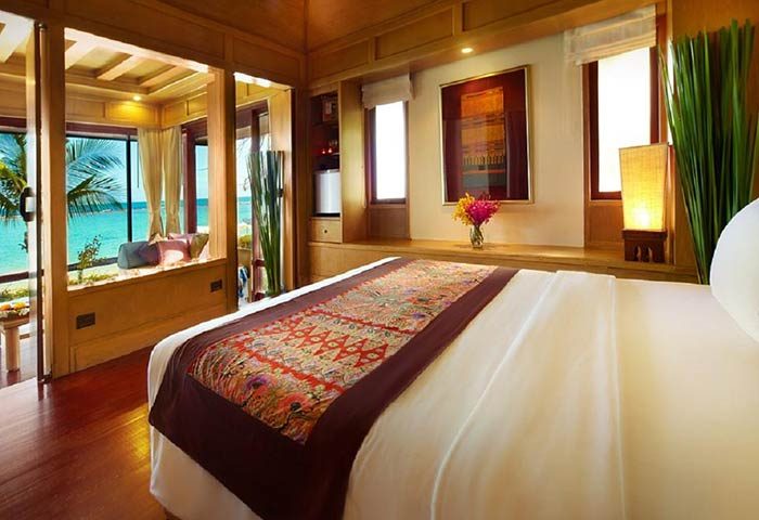 Gay-friendly Chaweng Regent Beach Resort room. Beach view from bed. Tropical decor. Ideal gay travel destination. Thailand hotel.