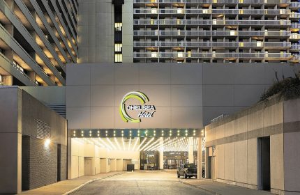 Chelsea Hotel Toronto entrance. This gay-friendly hotel offers a welcoming stay. The building's architecture is modern and inviting.