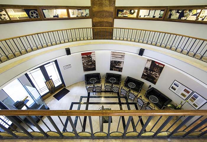 Cinema Hotel, an Atlas Boutique Hotel lobby from above. Gay-friendly hotel with vintage movie decor. A unique stay for gay travelers.