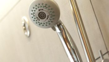 Shower head in a bathroom at Citadines Central Shinjuku Tokyo, a gay-friendly hotel. Enjoy a comfortable stay in Shinjuku, Tokyo.