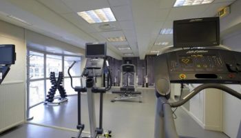 Citadines Les Halles Paris gym. Treadmills, elliptical trainers, and weights for a workout. Gay-friendly, pet-friendly hotel fitness center.